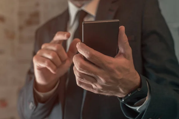 Businessman Using Mobile Phone Fake News Infodemic Concept Tabloid Newspaper — Stock Photo, Image