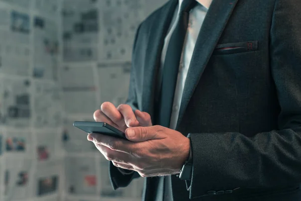 Businessman Using Mobile Phone Fake News Infodemic Concept Tabloid Newspaper — Stock Photo, Image