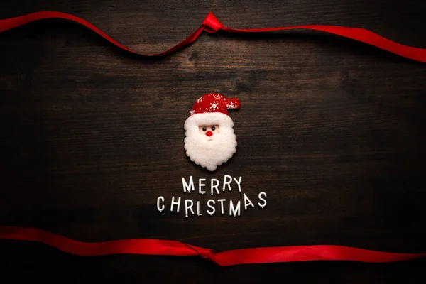 サンタクロースはあなたにメリークリスマスを願っています クリスマス休暇のメッセージのためのコピースペースとトップビューフラットレイ画像 — ストック写真