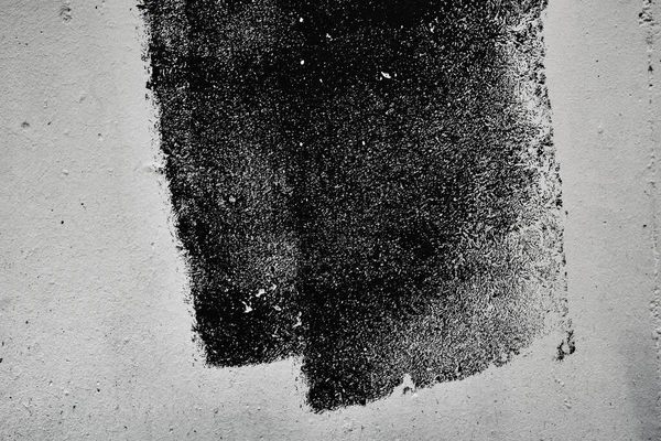 白墙上黑色涂料的擦拭纹理图样 干刷技术 — 图库照片