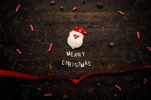 Merry Christmas Text Santa Claus Flat Lay Top View Dark — Stock Photo, Image