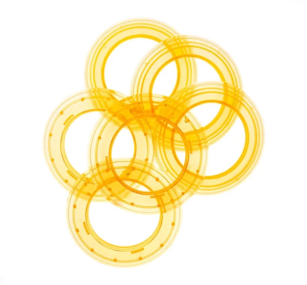 Plast ögla gardin hängande ringar för polacker, gul, isolerade på vitt. Klipp tillsammans. — Stockfoto