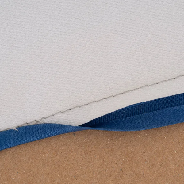 Application of bias binding on seam edge. Home sewing. — Stock Photo, Image
