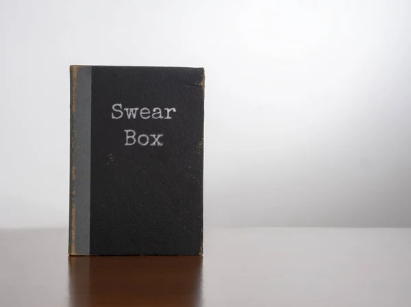 Vintage swear box, isolated on white background. New Year Resolution maybe. — Stock Photo, Image