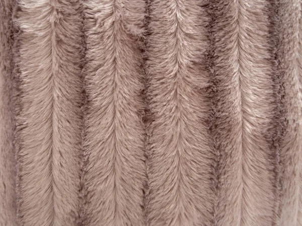 Fake, faux fur fluffy background, beige stripes. — Stock Photo, Image