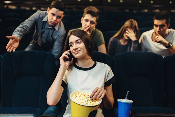 Young Woman Talking Phone Cinema Audience Dissatisfied Showtime Movie Watching — Stock Photo, Image
