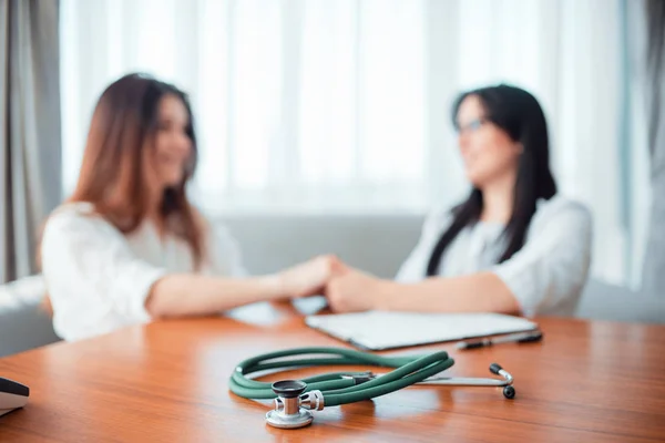 Doctor Examining Female Patient Professional Healthcare Stethoscope Foreground — Stock Photo, Image