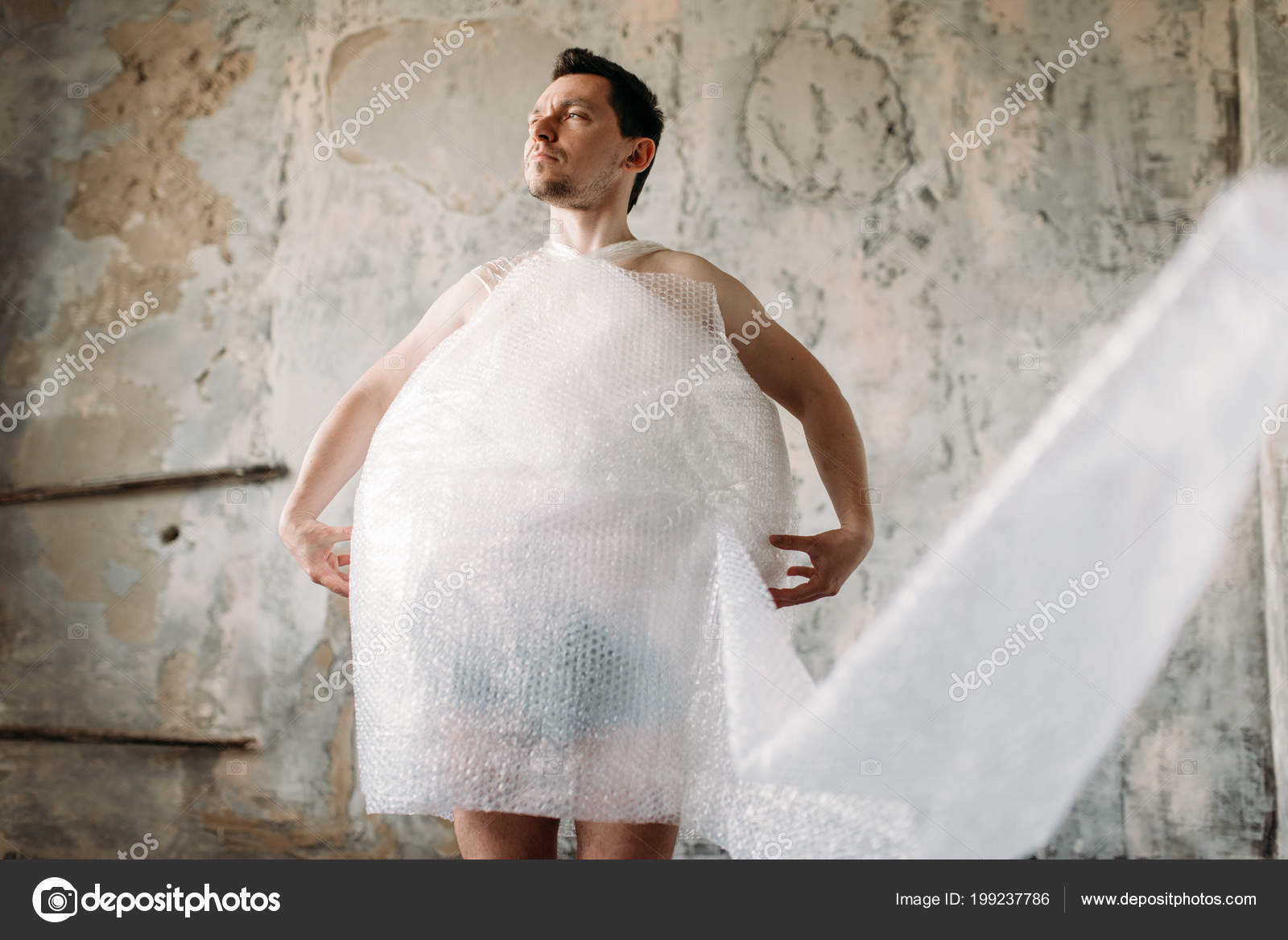Naked Freak Man Wrapped Packaging Film Posing Grunge Room Interior Stock  Photo by ©Nomadsoul1 199237786