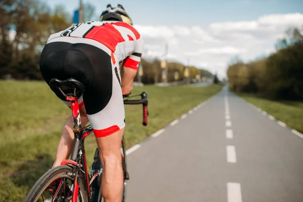 Male Cyclist Helmet Sportswear Riding Bicycle Back View — Stock Photo, Image