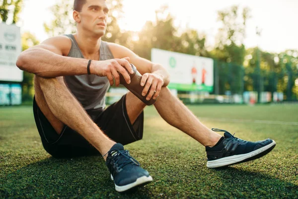 Male Athlete Relaxing Outdoor Fitness Workout Strong Sportsman Sitting Grass — Stock Photo, Image