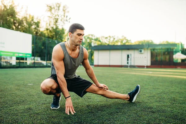 Male Athlete Outdoor Fitness Workout Sportsman Sits Grass Doing Stretching — Stock Photo, Image