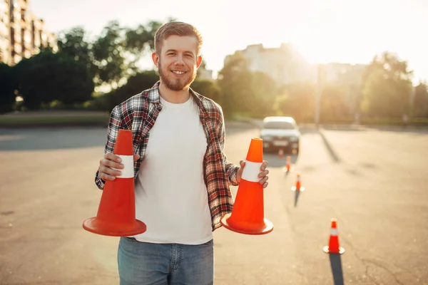 Male Vehicle Instructor Holds Cones Hands Examination Driving School Concept — Stock Photo, Image