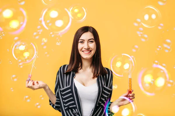 Pretty Woman Blows Soap Bubbles Yellow Background Female Person Blowing — Stock Photo, Image