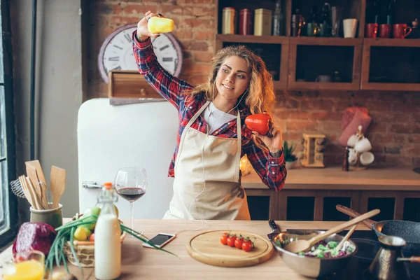 Smiling Housewife Headphones Apron Holding Fresh Pepper Hands Dance Kitchen — Stock Photo, Image