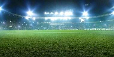 Futbol stadyumu, parlak ışıklar, görünümden alan çim. Çim, kimse Bahçesi, Tribün arka plan üzerinde oyun hayranları ile
