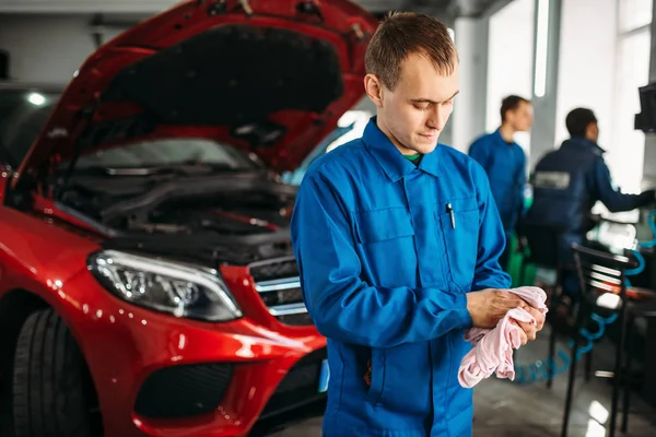 Mechanic Wipes His Hands Repairing Car Motor Diagnostic Vehicle Opened — Stock Photo, Image