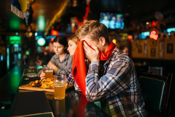 Sad Football Fan Covers Face Hands Counter Sports Bar Broadcasting — Stock Photo, Image