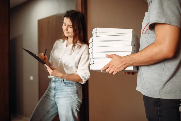 Female Customer Signs Order Pizza Delivery Boy Holds Carton Boxes — Stock Photo, Image