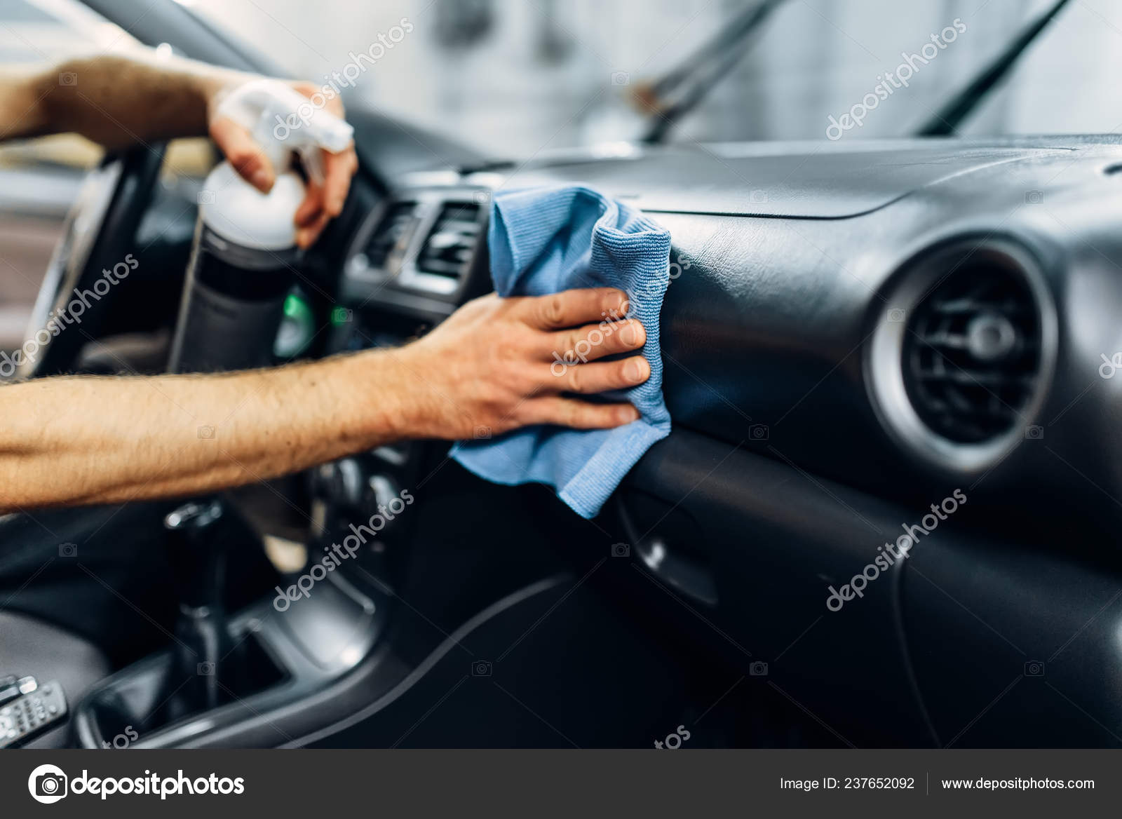 Carwash, Worker Cleans Salon with Steam Cleaner Stock Image