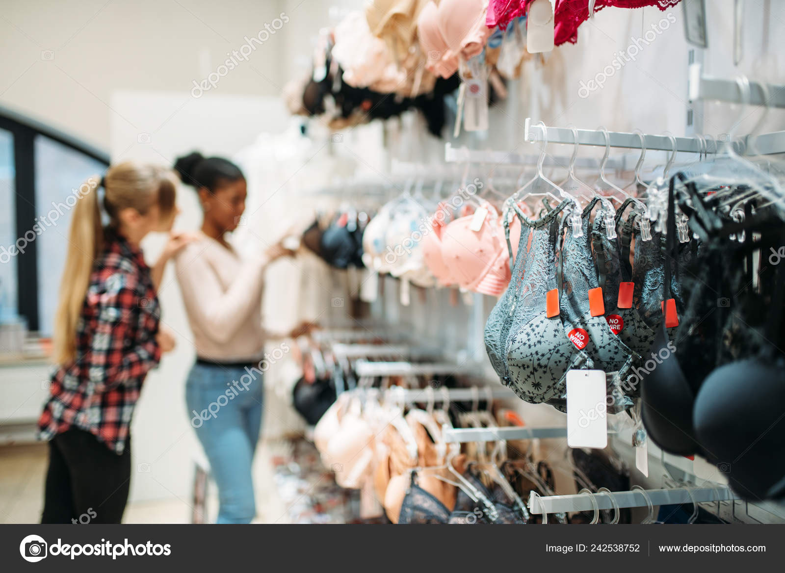 Two Women Choosing Underwear Shopping Shopaholics Clothing Store