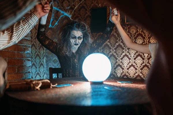 Scary Witch Reads Magic Spell Crystal Ball Young People Hands — Stock Photo, Image