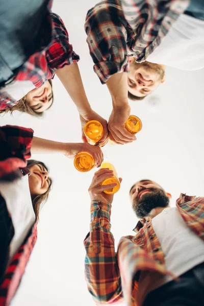 Smiling Friends Clink Bottles Beer Bottom View Home Party Good — Stock Photo, Image