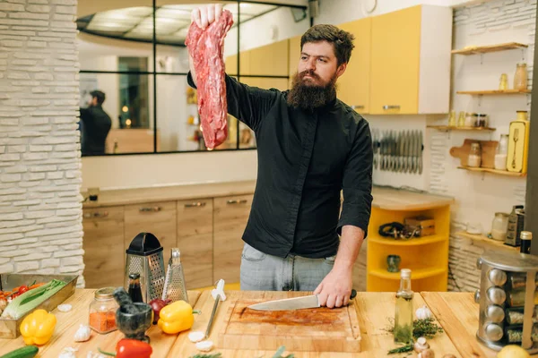 Man Holds Piece Fresh Raw Meat Kitchen Interior Background Chef — Stock Photo, Image