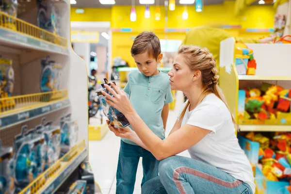 Happy Mother Her Little Son Choosing Toys Kids Store Mom — Stock Photo, Image