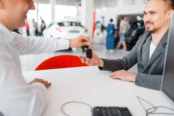 Manager Gives Buyer Key New Car Showroom Male Customer Buying — Stock Photo, Image