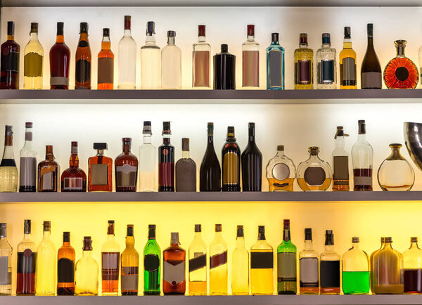Luxury alcohol bar, beverages for cocktails. Drinks counter in nightclub or restaurant