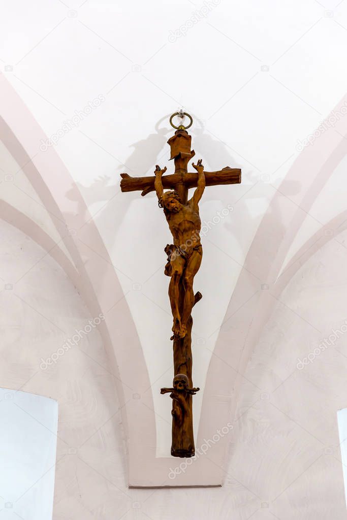 Ancient wooden crucifixion in museum, Europe, nobody. Old european architecture and style, famous places for travel and tourism