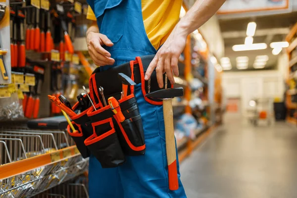 Male Builder Trying Tool Belt Shelf Hardware Store Constructor Uniform — Stock Photo, Image