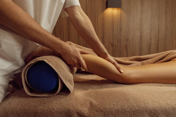 Male Masseur Stretching Legs Young Woman Towel Professional Massage Massaging — Stock Photo, Image
