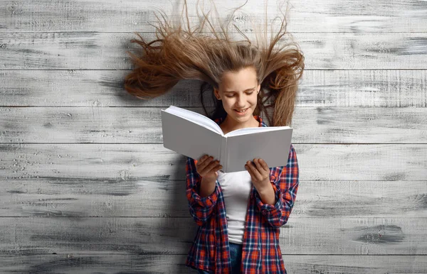 Little Girl Reding Book Powerful Airflow Studio Developing Hair Windy — Stock Photo, Image