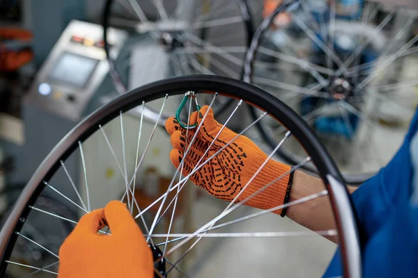 Worker Gloves Installs New Bicycle Spokes Factory Bike Wheels Assembly — Stock Photo, Image