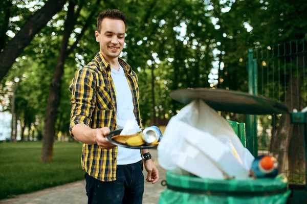 Young Volunteer Puts Trash Plastic Bin Park Volunteering Male Person — Stock Photo, Image