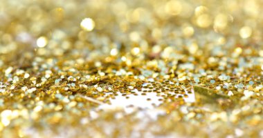 Altın glitter bulanıklık bir arka plan oluşturan ışıklar