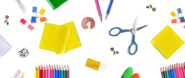 Top view on group of colorful  school supplies on white background — Stock Photo, Image