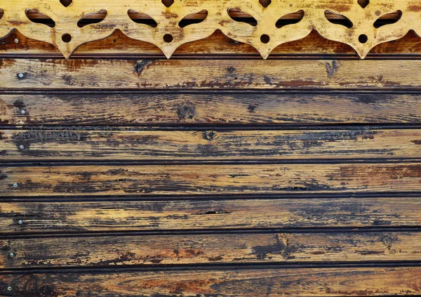 Fond en bois avec vieilles planches disparues et masques de carnaval découpés — Photo