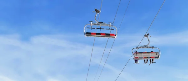 Chairlifts One Empty Other Transporting People Winter Resort Blur Sky — Stock Photo, Image