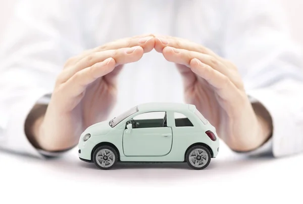 Car Insurance Concept Small Toy Car Covered Hands — Stock Photo, Image
