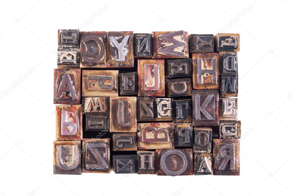 Old wooden block letters isolated on white background 