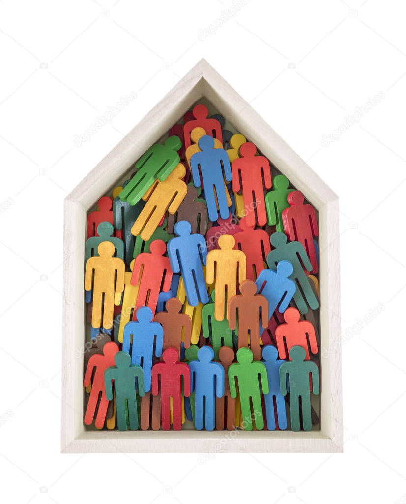 Wooden house with colorful painted group of people figures isolated on white background 