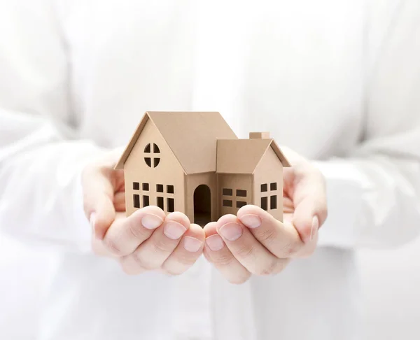 Property Insurance Cardboard House Miniature Hands — Stock Photo, Image