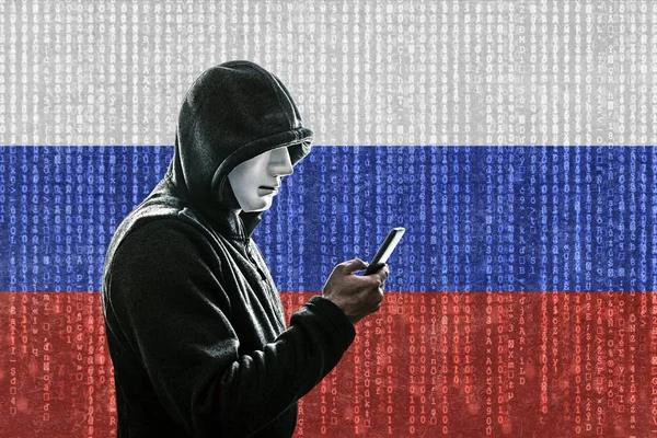 Russian Hooded Hacker Mask Holding Smartphone — Stock Photo, Image