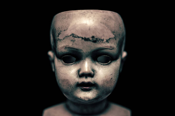 Creepy doll in the dark 