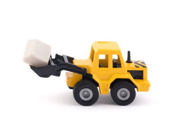 Boş bilgisayar anahtarına sahip buldozer kırpma yolu ile beyaz arkaplanda izole edildi