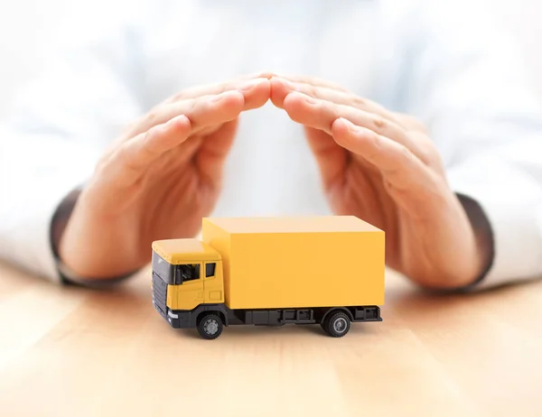 Yellow Cargo Delivery Truck Miniature Protected Hands — Stock Photo, Image