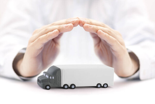 Long truck with a trailer protected by hands