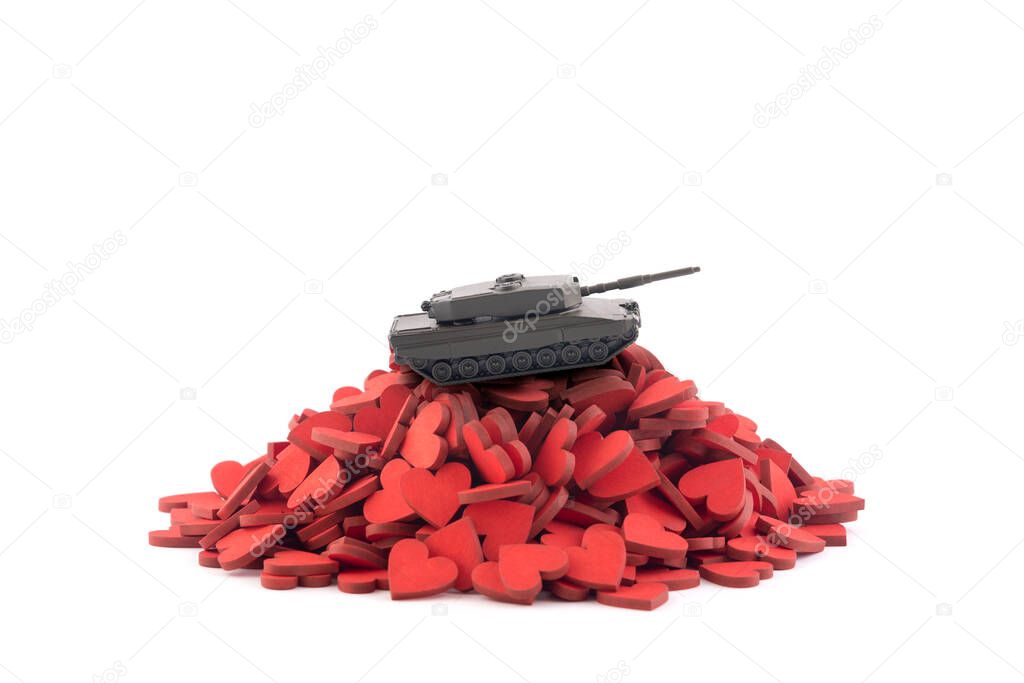 Tank on pile of hearts isolated on white background